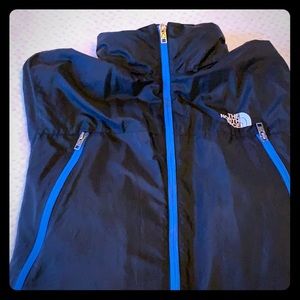 Men’s North Face windbreaker with pack-away hood.